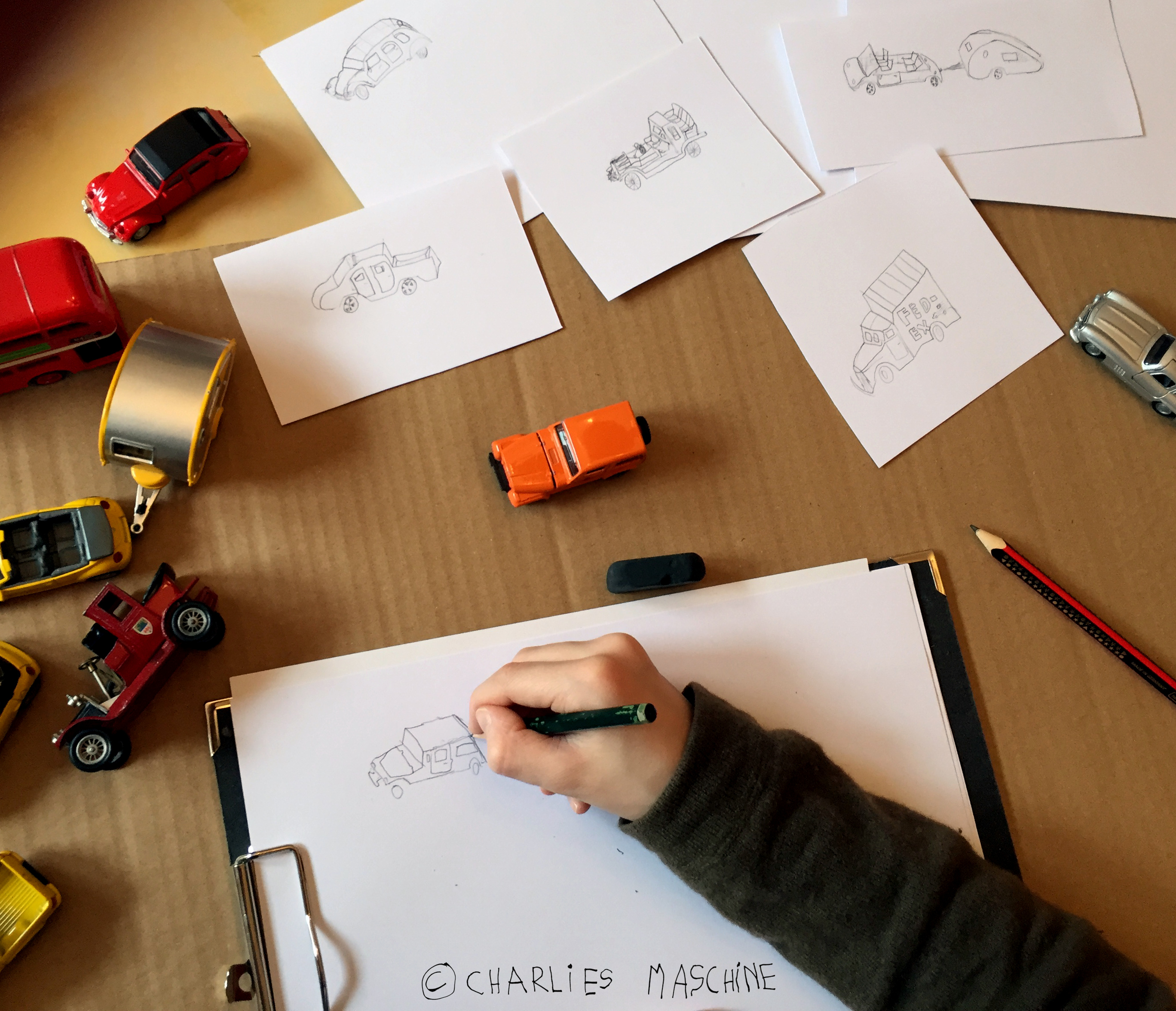 Charlie draws cars – pencil drawings; Charlie age 10